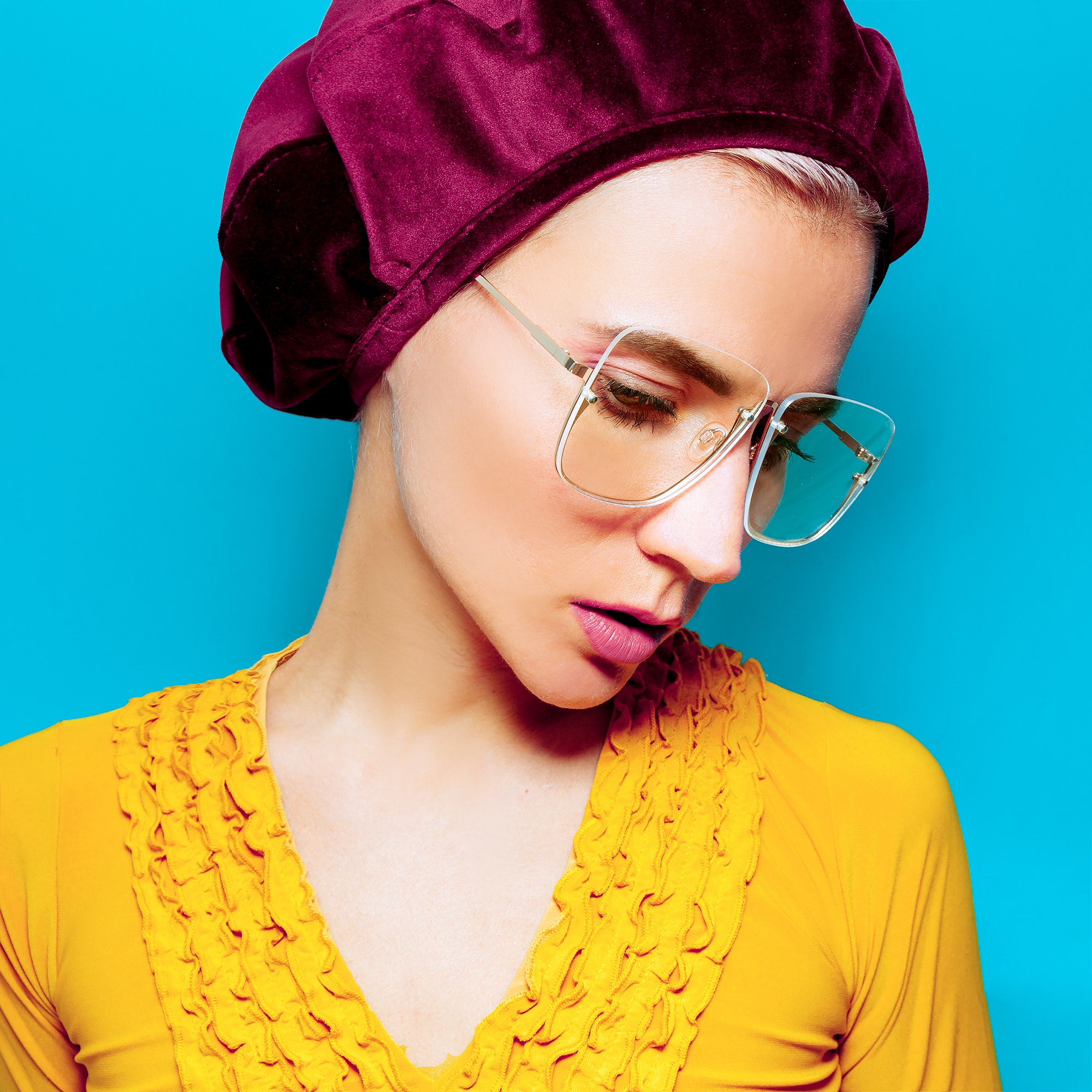Home model in fashion accessory beret and glasses retro style.jpg